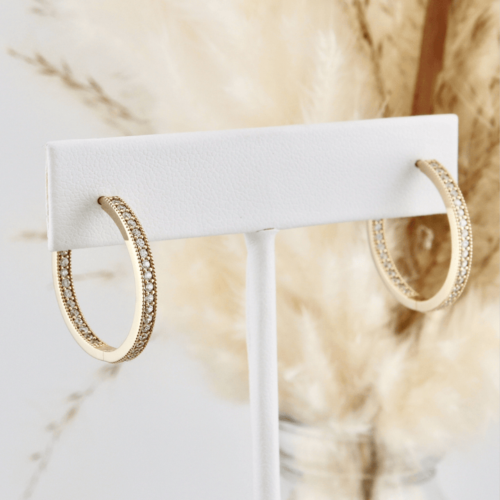 - Boucles d'oreilles Boucles d'oreilles huggies Éclats + en or 10K
