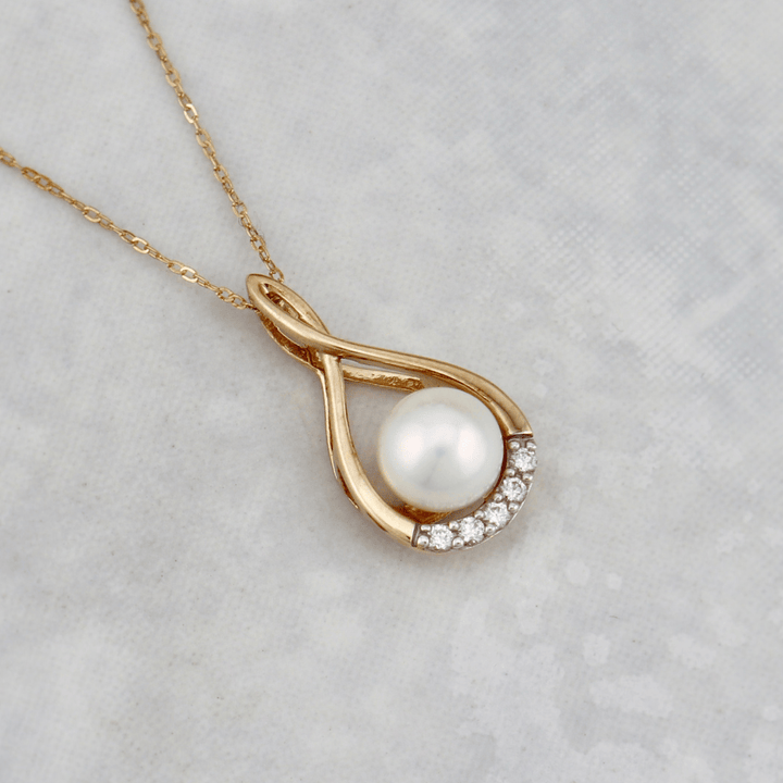 - Colliers Or jaune 10K Collier Orya en or 10K, perle et diamants