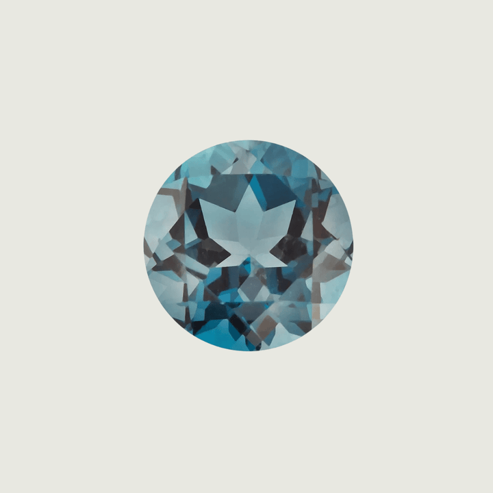 Mathieu Blanchard Topaze Naturel Bleu London Taille brillant rond 4 mm