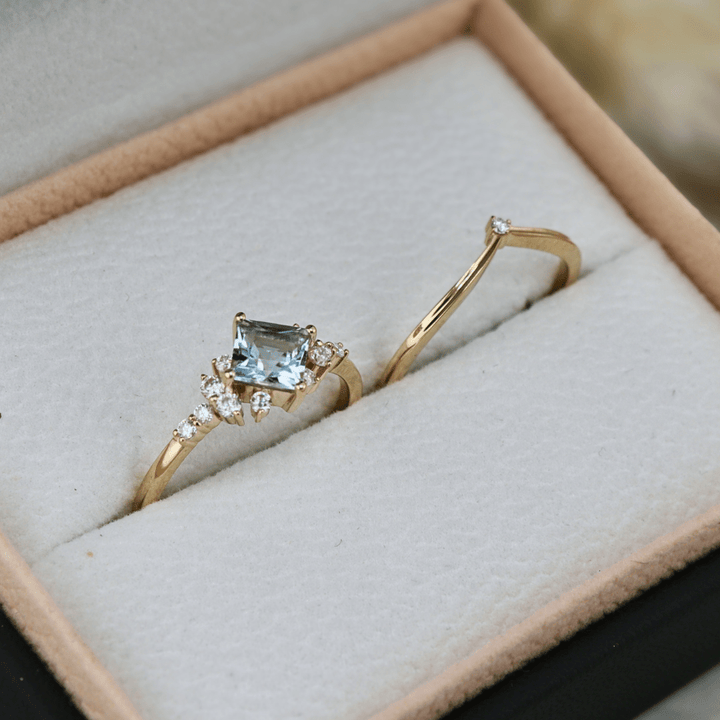 Mathieu Blanchard Bagues Bagues Ensemble d'alliances Moissanites et Topaze bleu princesse