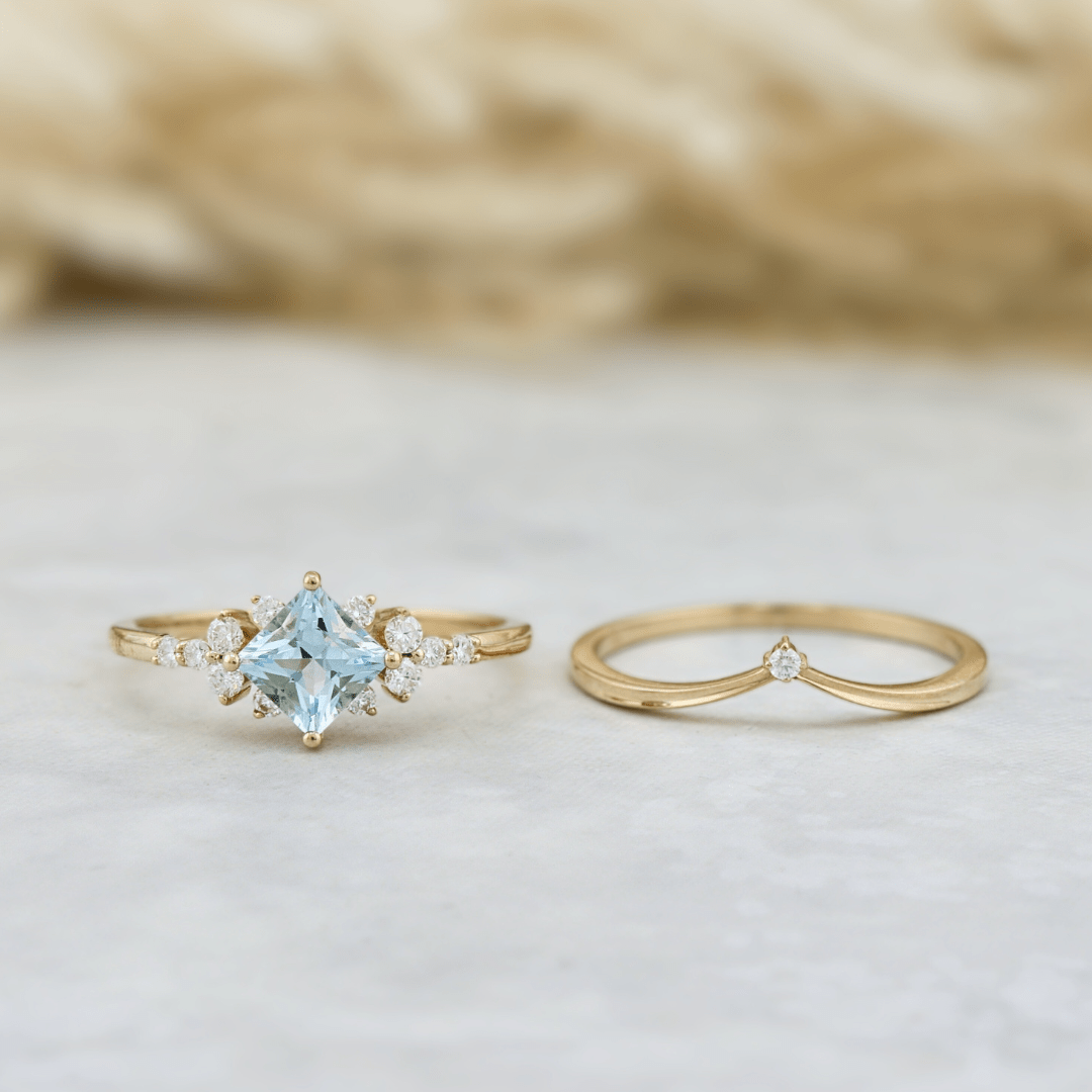 Mathieu Blanchard Bagues Bagues Ensemble d'alliances Moissanites et Topaze bleu princesse