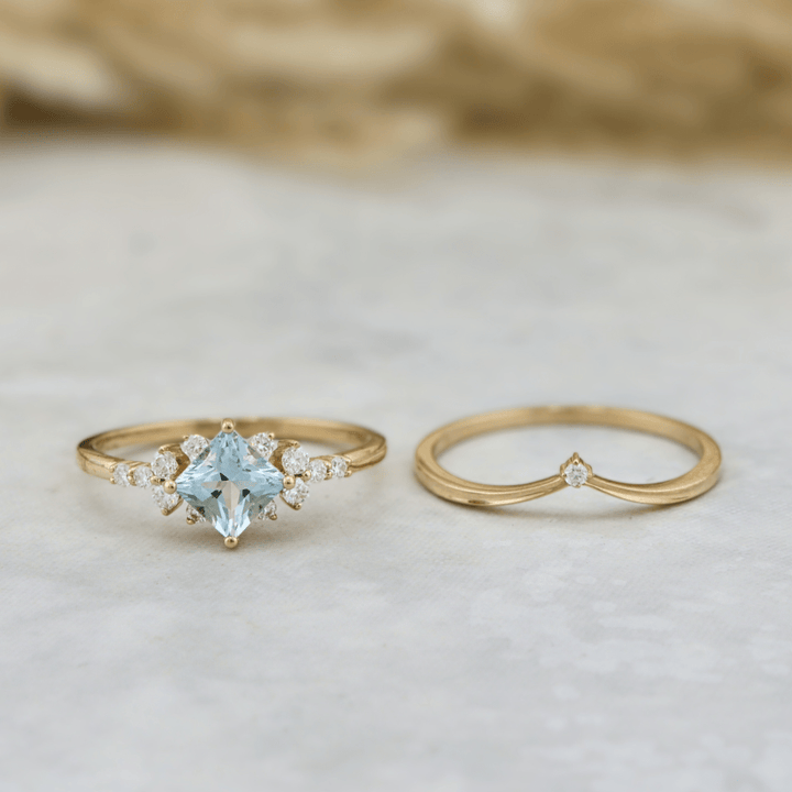 Mathieu Blanchard Bagues Bagues Ensemble d'alliances Moissanites et Topaze bleu princesse