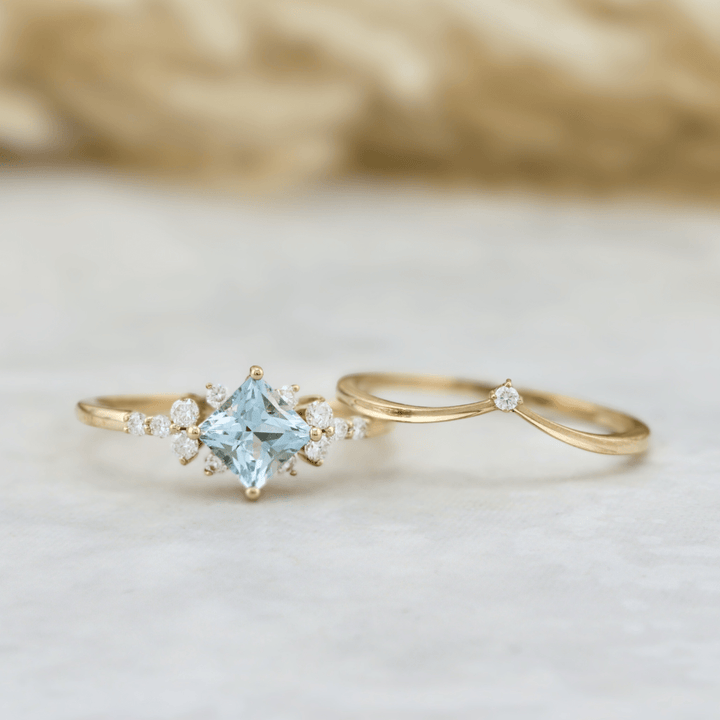 Mathieu Blanchard Bagues Bagues Ensemble d'alliances Moissanites et Topaze bleu princesse