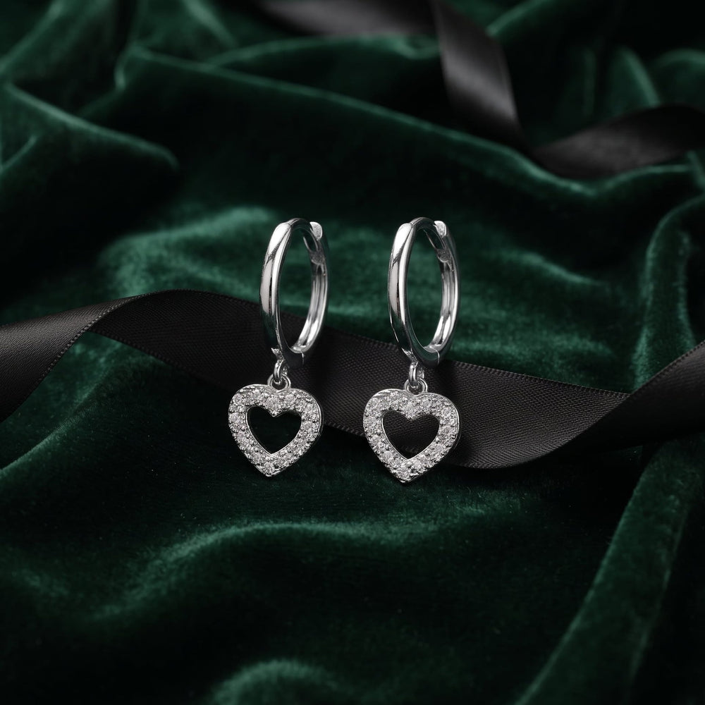 Boucles d'oreilles Huggies Coeur en argent sterling Mathieu Blanchard Boucles d'oreilles Boucles d'oreilles Huggies Coeur en argent sterling | Mathieu Blanchard Mathieu Blanchard Joaillerie