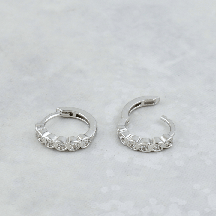 Mathieu Blanchard Boucles d'oreilles Boucles d'oreilles Huggies Coeurs en argent sterling