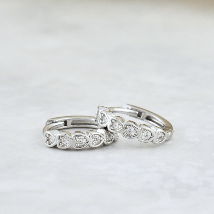 Mathieu Blanchard Boucles d'oreilles Boucles d'oreilles Huggies Coeurs en argent sterling
