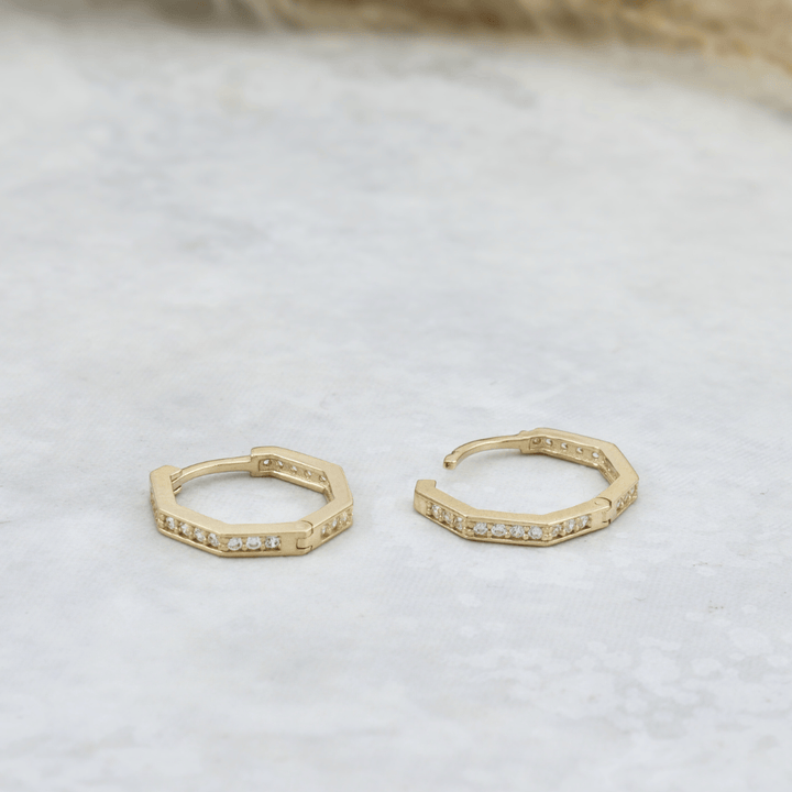 - Boucles d'oreilles Boucles d'oreilles huggies Heptagone en or 10K