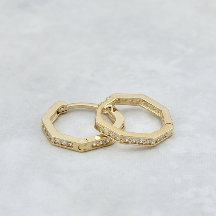 - Boucles d'oreilles Boucles d'oreilles huggies Heptagone en or 10K