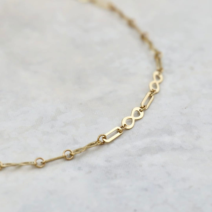 - Bracelet de cheville Chaîne Infini en or 10K