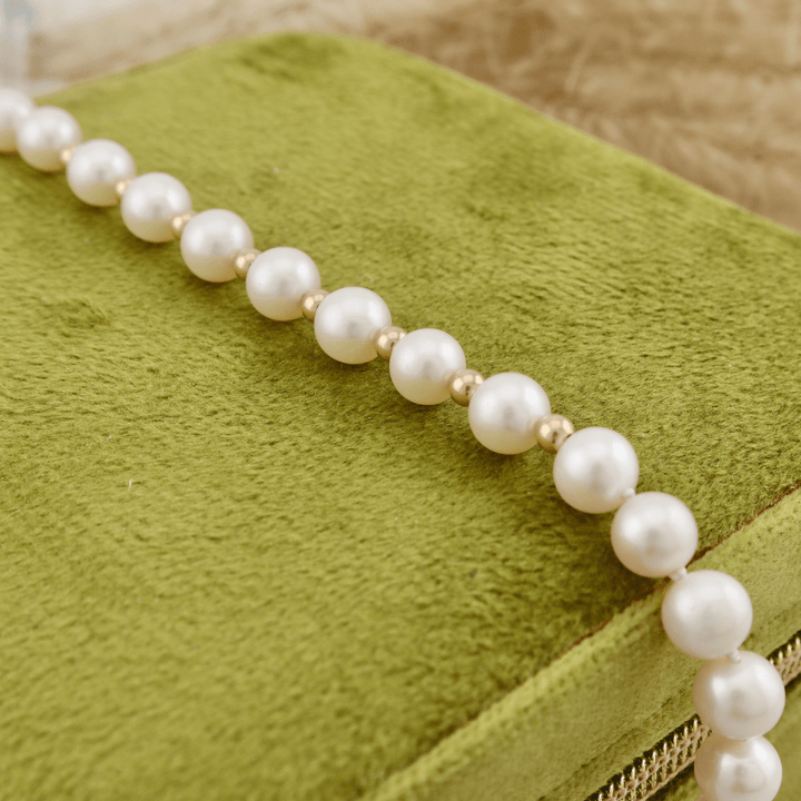 Bracelet de perles 6 mm et en or jaune 14K Mathieu Blanchard Joaillerie Bracelet Perles  6mm - AAA  et or 14K | Mathieu Blanchard Mathieu Blanchard Joaillerie