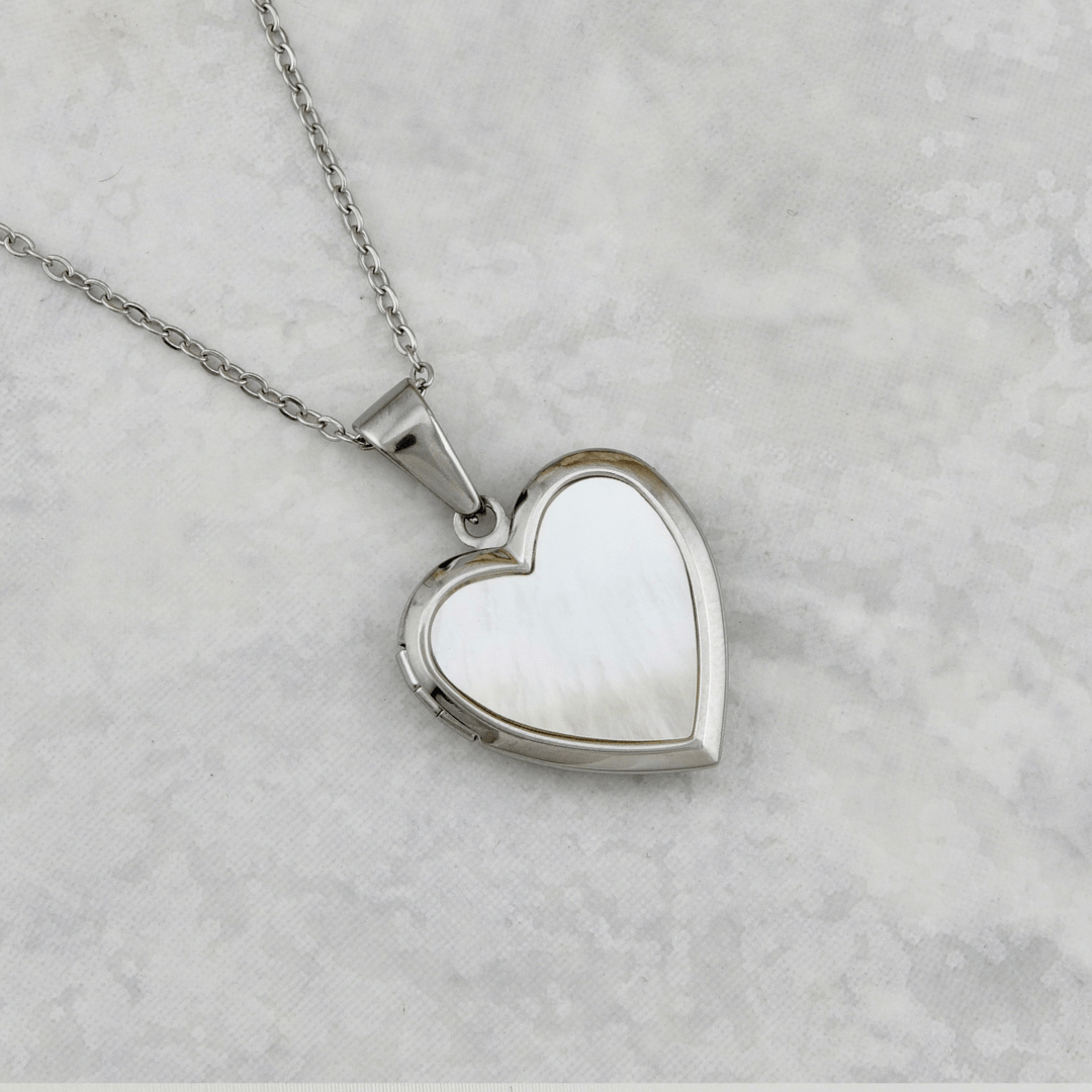 Collier porte photos Cœur en acier inoxydable Mathieu Blanchard Pendants Acier inoxydable PCOAM14182S Collier porte-photos Coeur en nacre de perle en acier inox Mathieu Blanchard Joaillerie