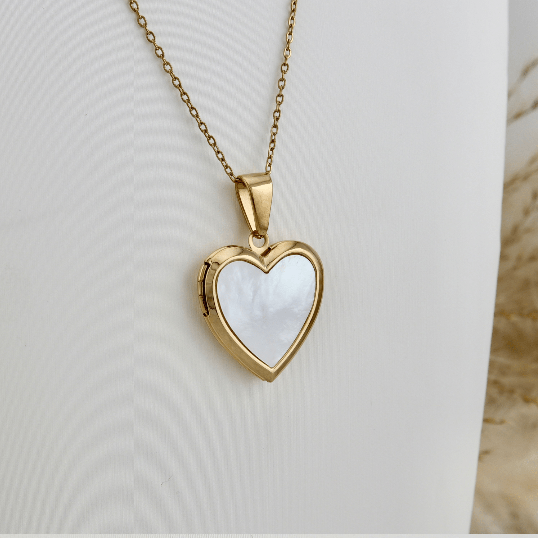 Collier porte photos Cœur en acier inoxydable Mathieu Blanchard Pendants Collier porte-photos Coeur en nacre de perle en acier inox Mathieu Blanchard Joaillerie