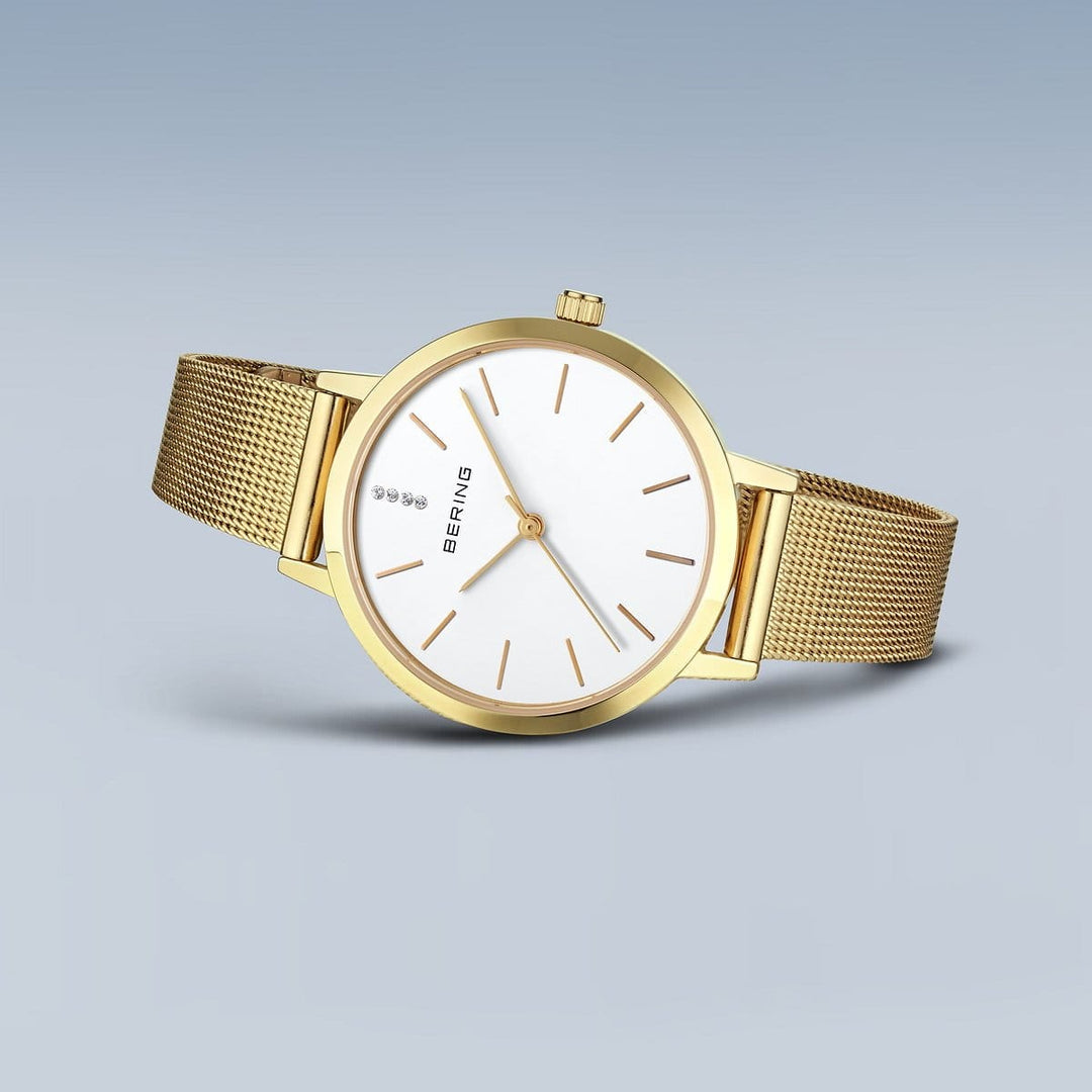 Ensemble cadeau Montre Bering Classic34mm 13434 334 GWP Bering Montre Acier inoxydable plaqué or jaune 13434-334-GWP Ensemble cadeau Montre Bering Classic Or 34mm 13434-334-GWP - Mathieu Blanchard - Dépositaire officiel Bering Canada Mathieu Blanchard Joaillerie