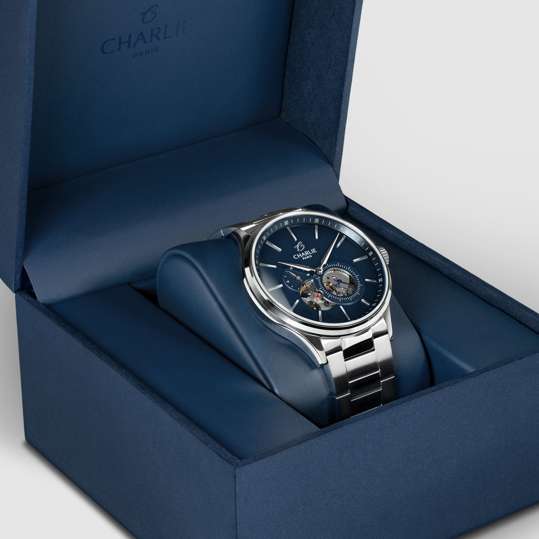 Montre Charlie Paris INITIAL Open Heart Bleu 40 mm en acier inoxydable Charlie Paris Montre Montre Charlie Paris INITIAL Open Heart - Bleu 40 mm | Dépositaire Officiel Canada | Mathieu Blanchard Joaillerie Mathieu Blanchard Joaillerie