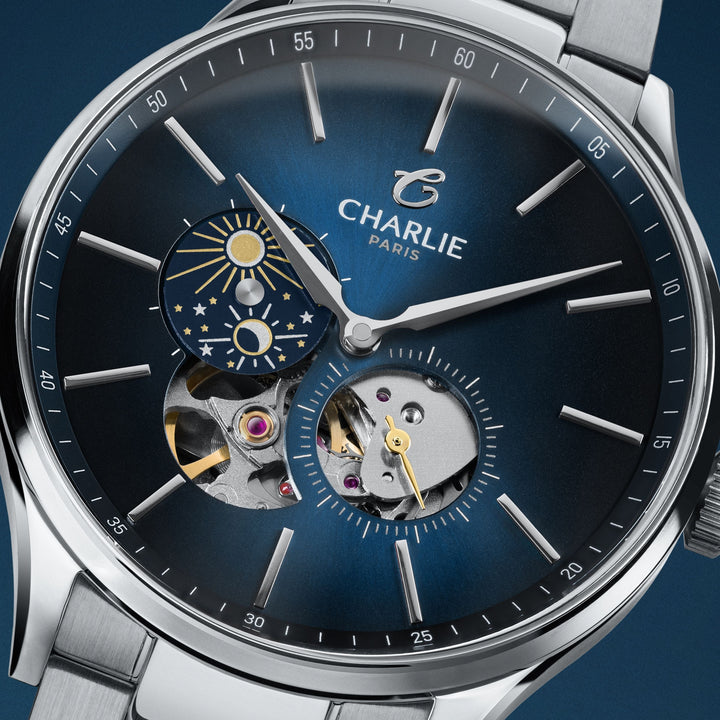 Montre Charlie Paris INITIAL Open Heart Jour/Nuit Bleu 40 mm en acier inoxydable Charlie Paris Montre Montre Charlie Paris INITIAL Open Heart Jour/Nuit - Bleu 40 mm | Dépositaire Officiel Canada | Mathieu Blanchard Joaillerie Mathieu Blanchard Joaillerie
