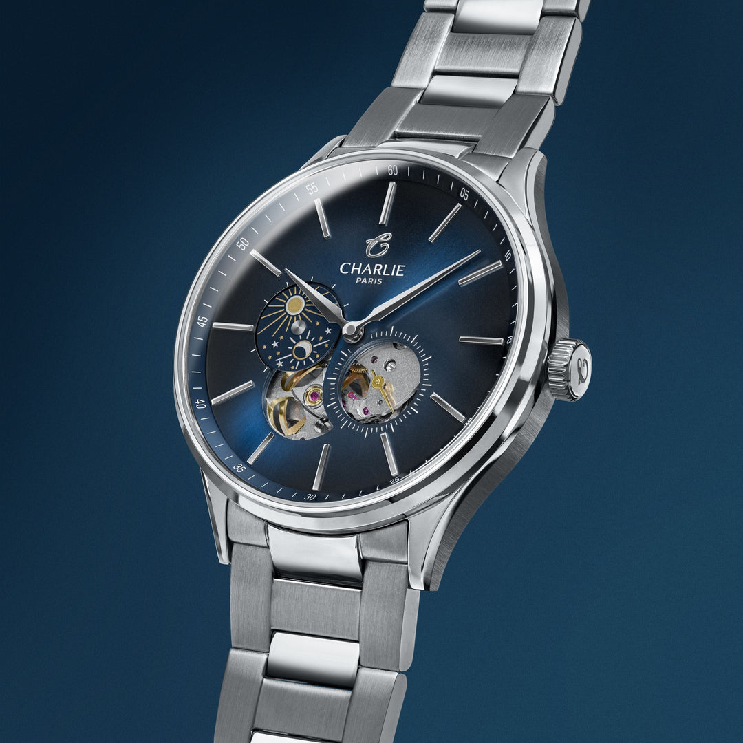 Montre Charlie Paris INITIAL Open Heart Jour/Nuit Bleu 40 mm en acier inoxydable Charlie Paris Montre Montre Charlie Paris INITIAL Open Heart Jour/Nuit - Bleu 40 mm | Dépositaire Officiel Canada | Mathieu Blanchard Joaillerie Mathieu Blanchard Joaillerie