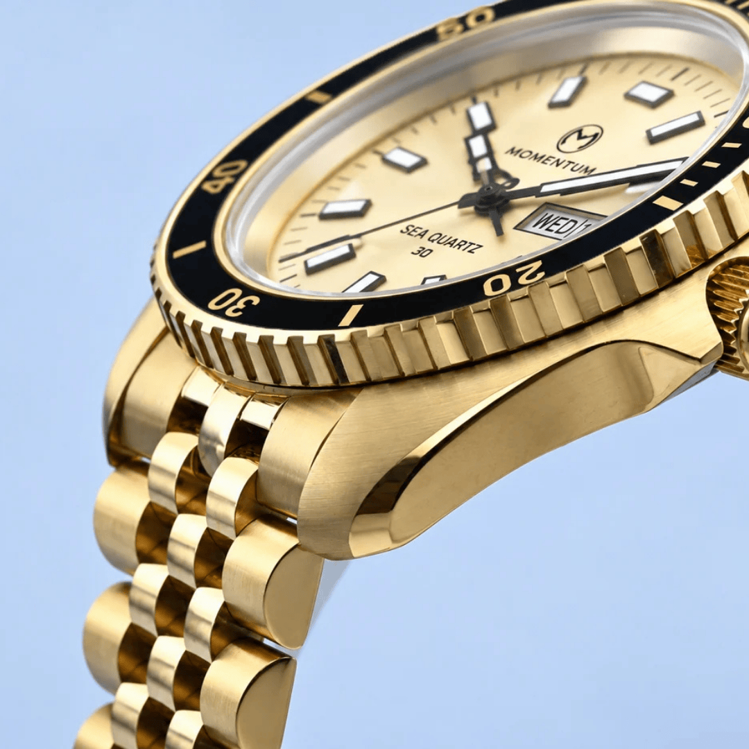 Montre Momentum Champagne Sea Quartz 30 - 42mm Momentum Montre Acier inoxydable plaqué or jaune 081AADBFC-EL-B-BK-B-BK-AGK-BH-AG-B-K10 Montre Champagne Sea Quartz 30 - 42mm - Dépositaire officiel Momentum Canada Mathieu Blanchard Joaillerie