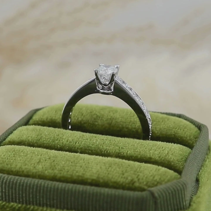 Bague solitaire diamants 0.74 ctw