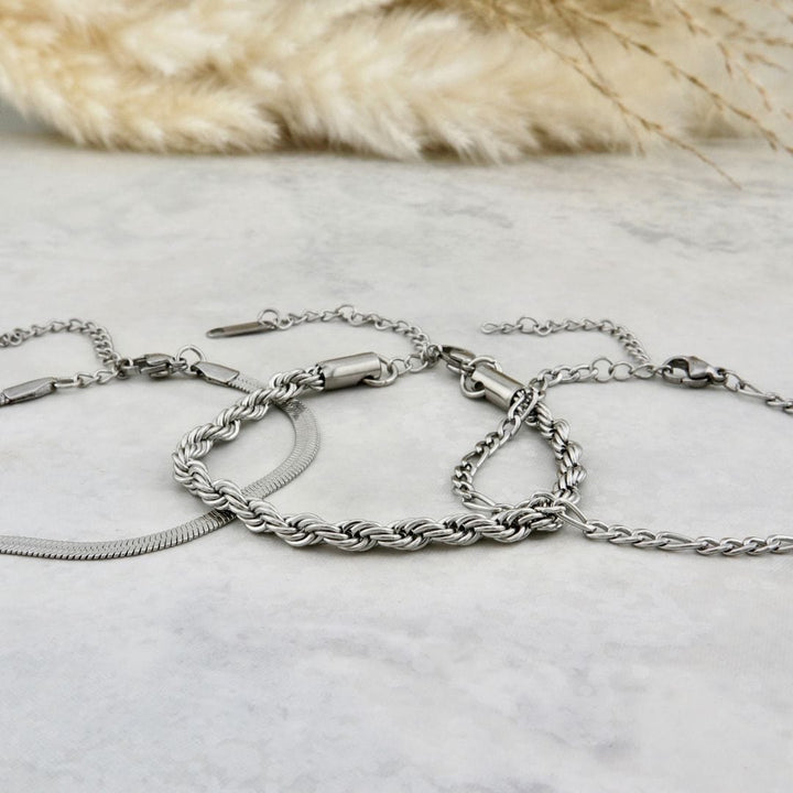 Trio de bracelets La Force en acier inoxydable Mathieu Blanchard Bracelets Acier inoxydable PTRM13022S Trio de bracelets Torsade - Figaro en acier inoxydable - unisexe Mathieu Blanchard Joaillerie